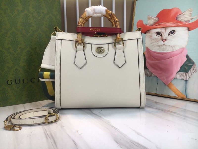 G*u*i top handle bags